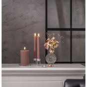 rosa batteriljus med räfflad yta