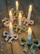 Rosettformade ljusstakar