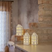 hus med belysning och timerfunktion